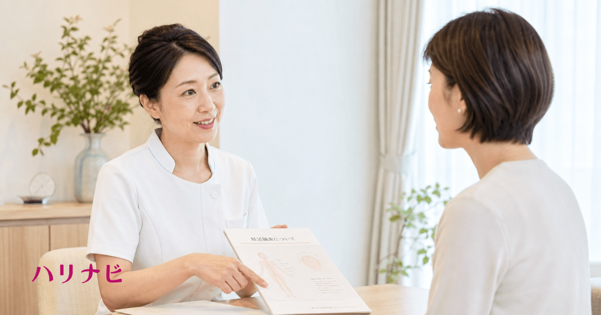 鍼灸院のカウンセリングで鍼灸師から説明を受ける女性のイメージ